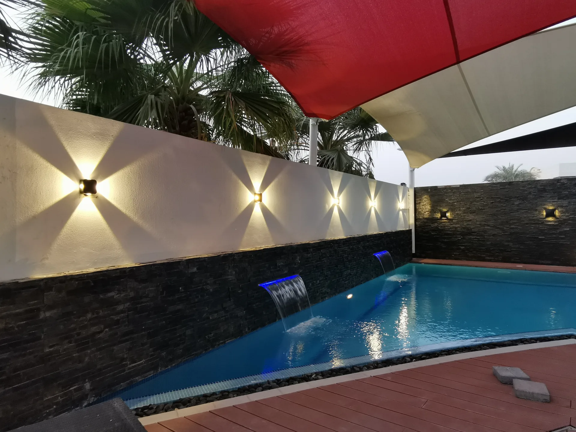 Completed outdoor pool terrace works by Benaa Contracting