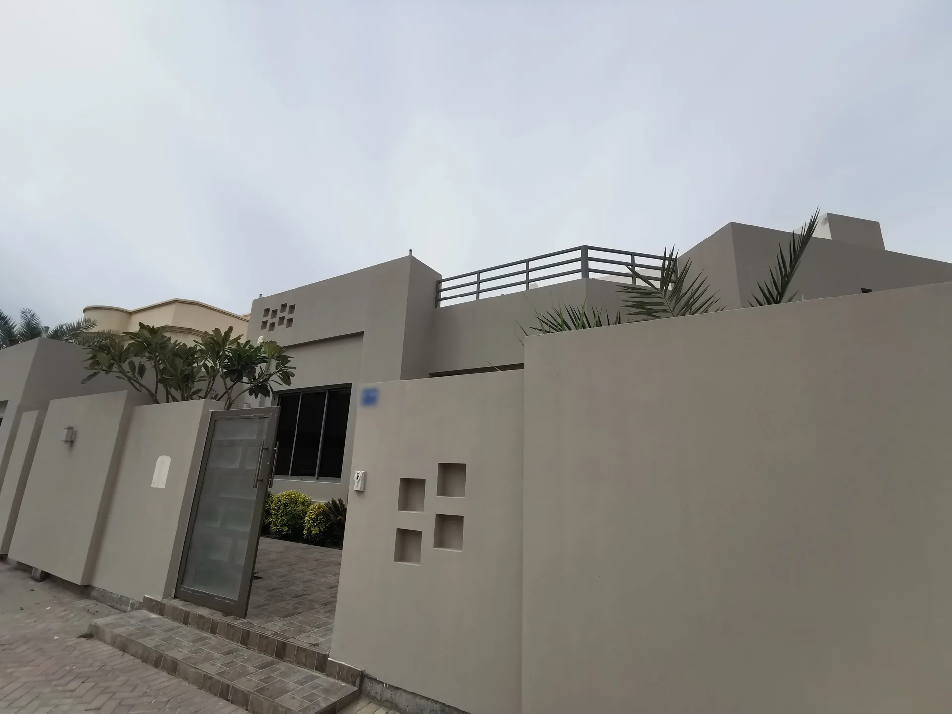 Private villa after external maintenance and repainting by Benaa Contracting